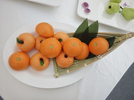 1747381663149019881.jpg 象形面点参展作品:橘子.jpg